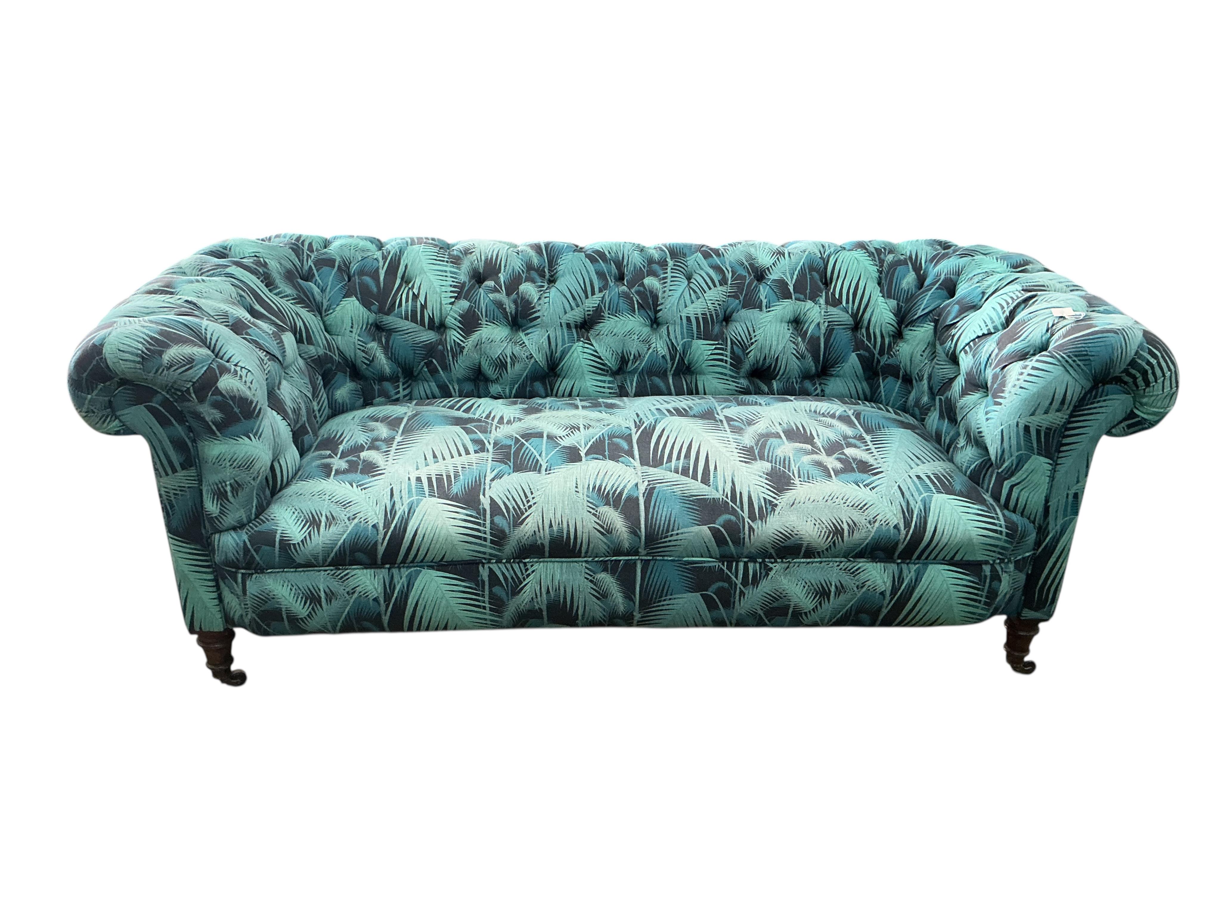 A late Victorian upholstered Chesterfield settee, width 190cm, depth 80cm, height 75cm
